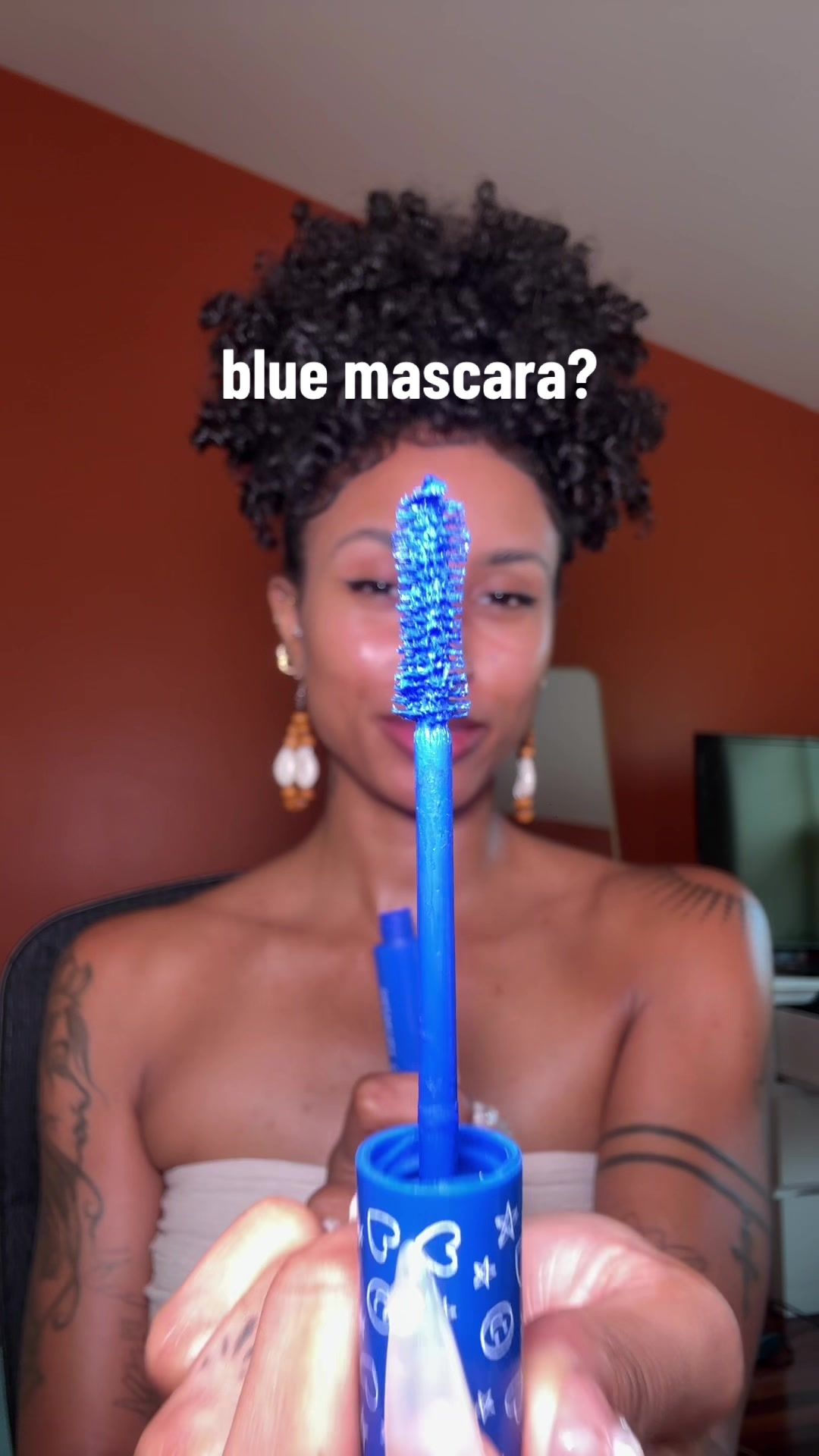 TikTok post by @okayyani for ColourPop. Caption reads: Making makeup fun again! Blue mascara is a vibe 🫐....
