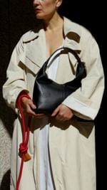 Instagram post by @allaboutlloyd_ for Russell & Bromley. Caption reads: Sunday strolls with Lloyd and @russellandbromley -....