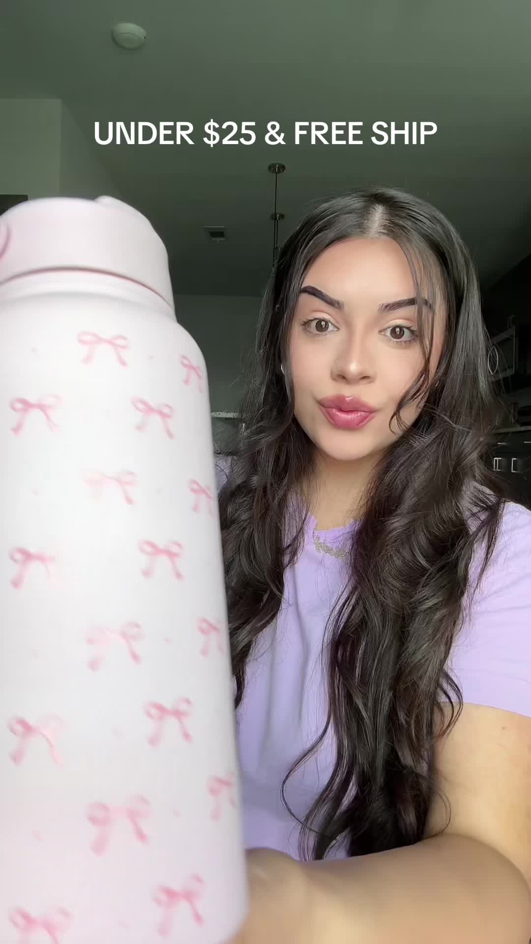 TikTok post by @val4hunnid for Sandjest. Caption reads: COQUETTE BOW BOTTLE 🎀💗✨  - @Sandjestgifts 🤍 -....