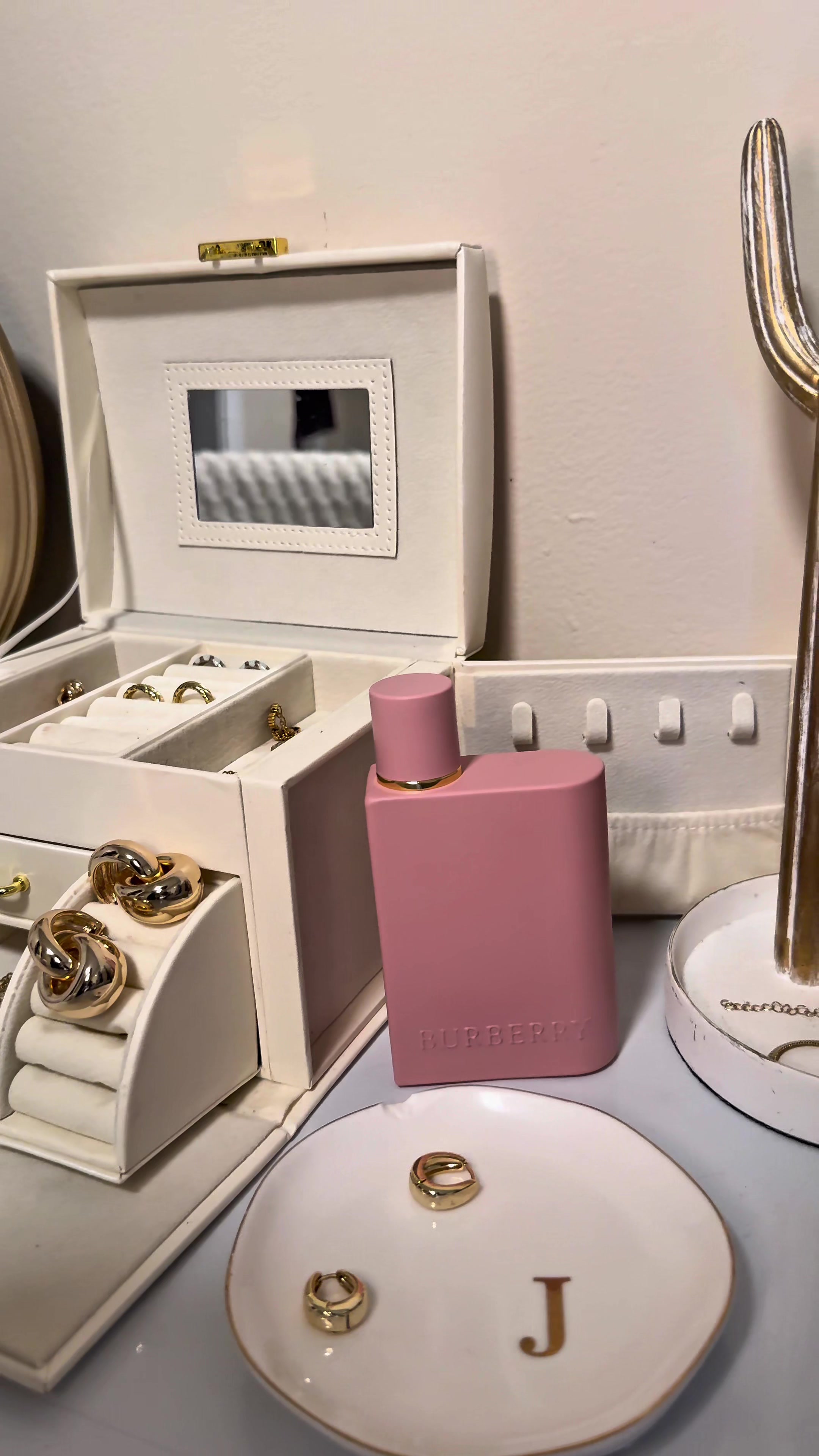 TikTok post by @jael_lobo17 for Burberry. Caption reads: The newest @Burberry her parfum with a trendy....