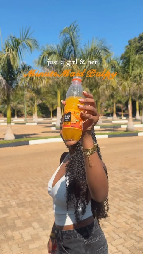 Instagram post by @dreamer.ix_ for Minute Maid. Caption reads: Just a girl & her Minute Maid Pulpy 🍊🤍 New look.....