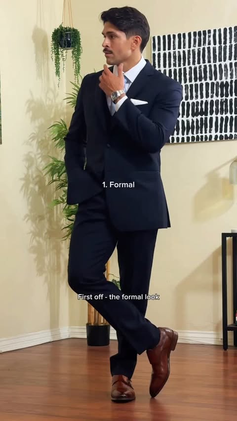 Instagram post by @naranjoedward for Men’s Wearhouse. Caption reads: [...] @kennethcole CHILLFLEX suit from....