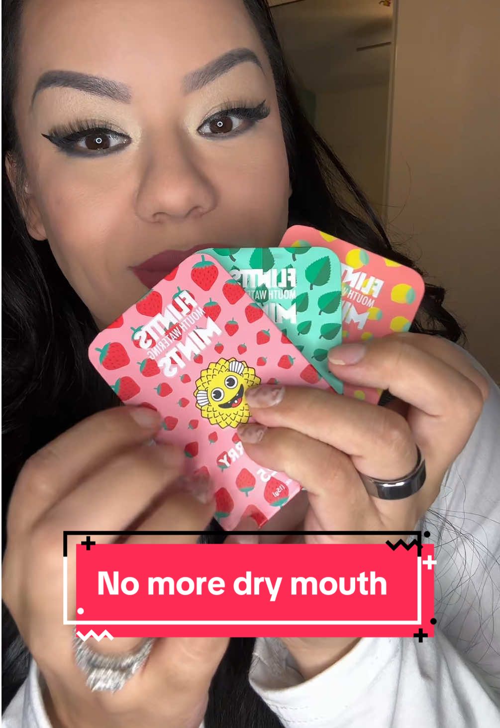 TikTok post by @lulucortes888 for Flintts Mints. Caption reads: [...] mouth or cotton mouth try these!! @Flintts....