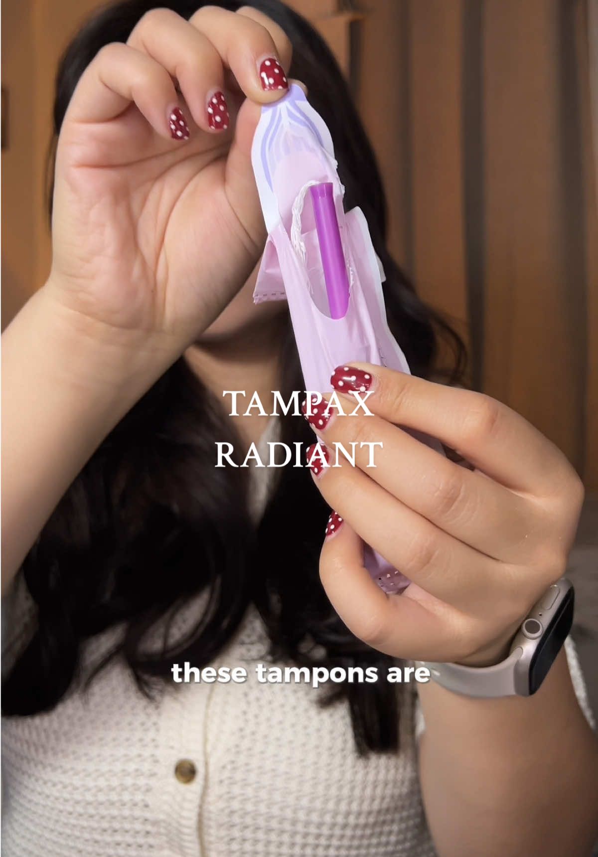 TikTok post by @janelle.alexandria for Tampax. Caption reads: #Tampax_Ad Tampax Radiant helps me go about my day....