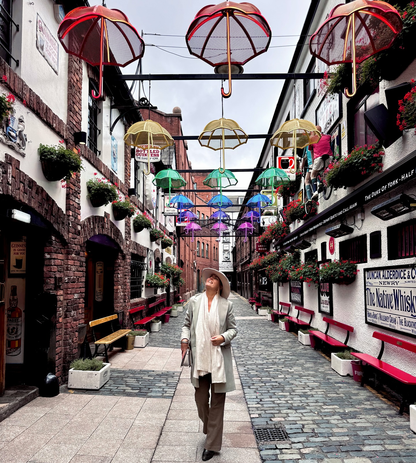 Instagram post by @authenticchica for Discover Northern Ireland. Caption reads: CITY GUIDE: TOP THINGS TO DO IN BELFAST - NORTHERN....