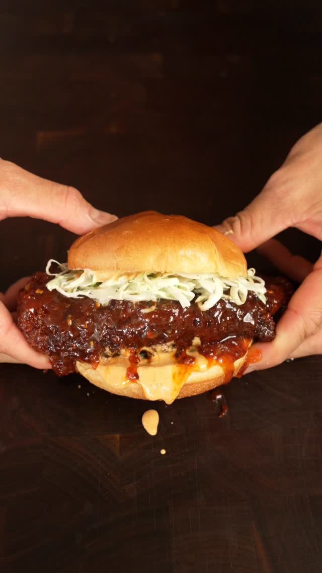 Instagram post by @owen.han for SAXX Underwear. Caption reads: Hot & spicy cajun chicken sandwich 🤝....