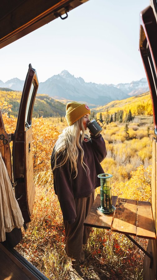 Instagram post by @michelle.lawrencee for AeroPress. Caption reads: Filling my cup one adventure at a time ☕️ this....