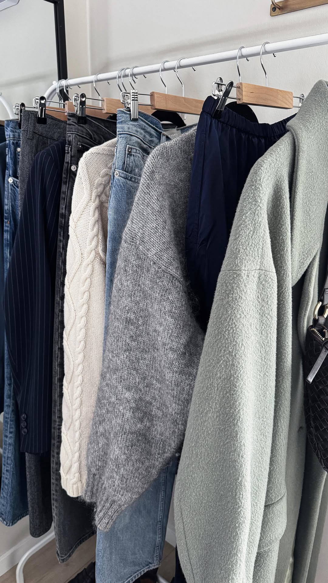 Instagram post by @useless_dk for Shaping New Tomorrow. Caption reads: [...] blazer + grey trousers @shapingnewtomorrow].