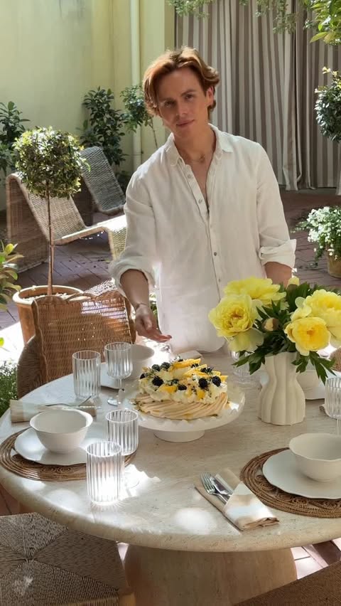 Instagram post by @louiburke for Woolworths. Caption reads: 15 minute chic and elegant pavlova. The perfect....