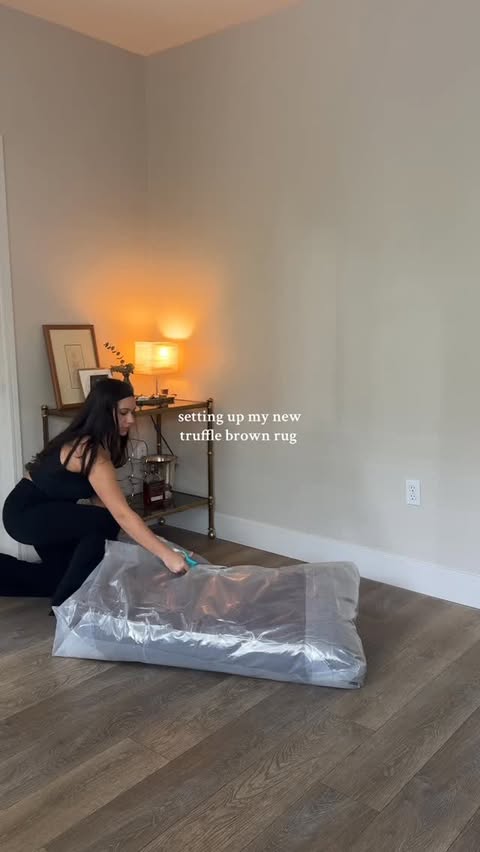 Instagram post by @kellylandsman for Rugs USA. Caption reads: It’s coming together little by little 🤎 • • •....