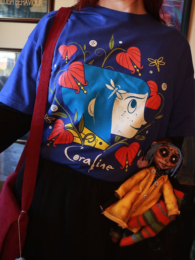 Instagram post by @soulsofbeldam for TruffleShuffle. Caption reads: [...] Coraline tshirts have arrived at....