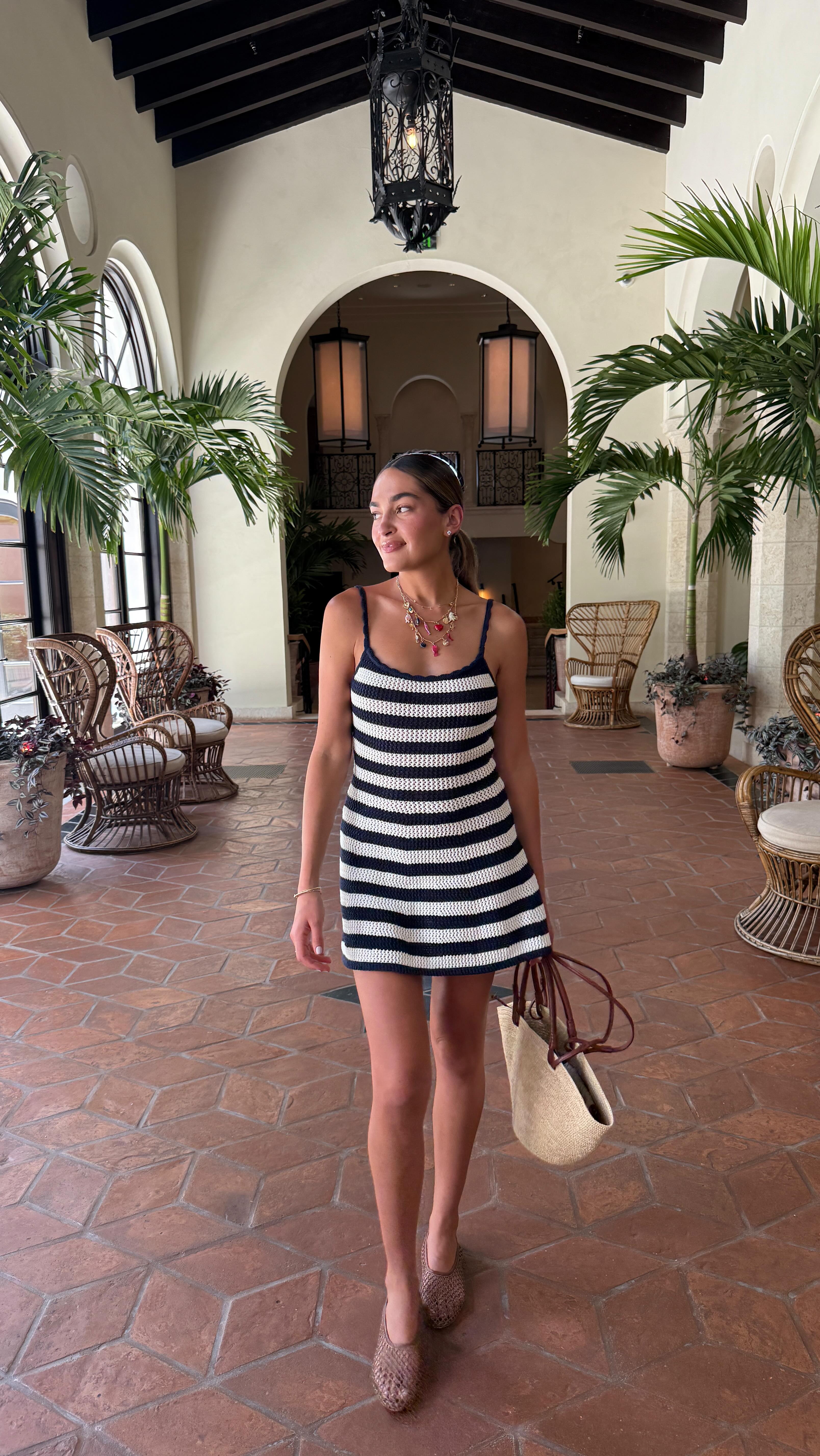 Instagram post by @rachelove for REVOLVE. Caption reads: Sometimes you just need to dress up, call a....