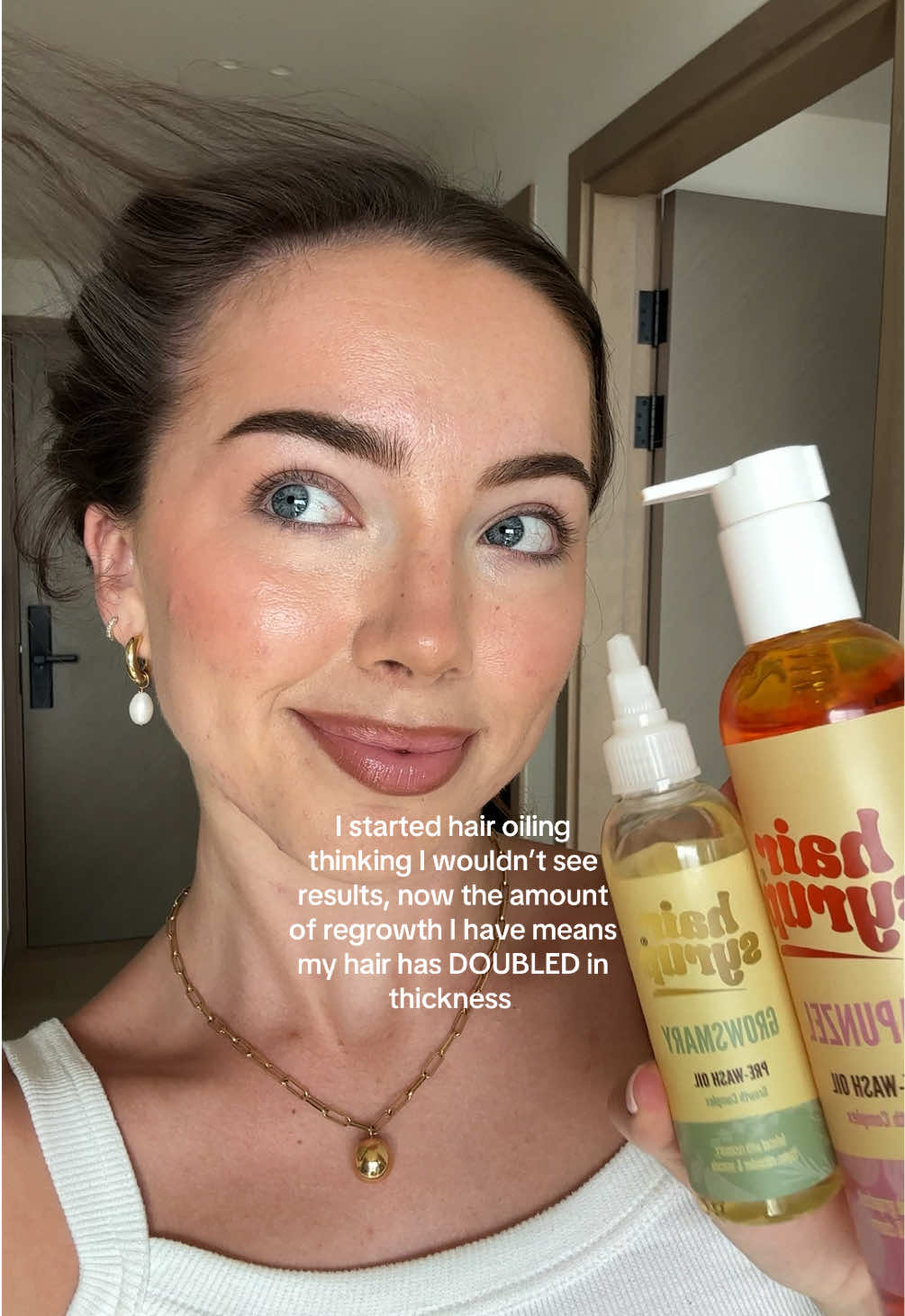 TikTok post by @taraabolger for Hair Syrup. Caption reads: a whole new hairline is crazy 👸🏻🪄🍯 @Hair Syrup....