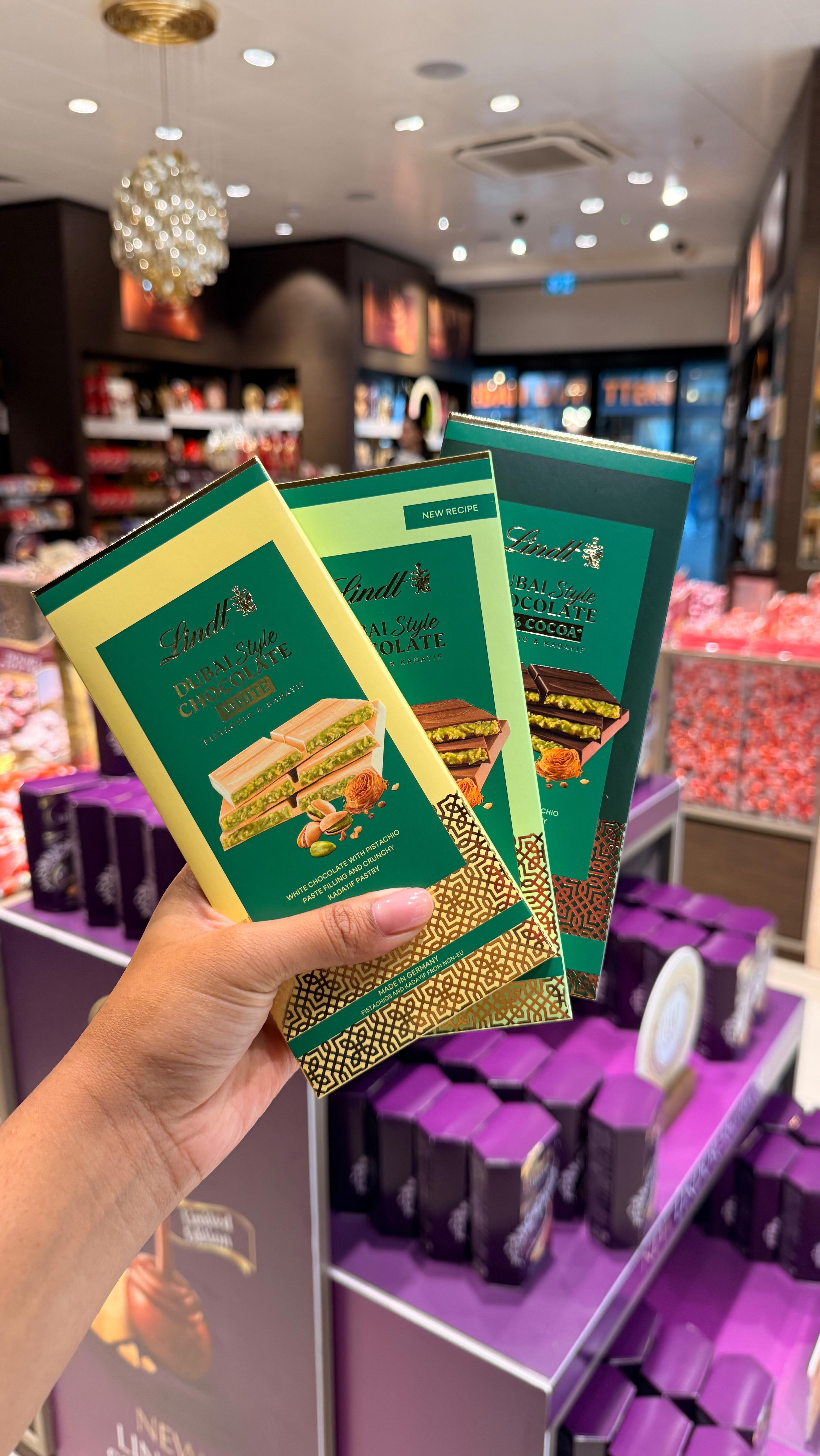 Instagram post by @veeneesta for Lindt. Caption reads: @lindtuk just dropped new white & dark Dubai-style....