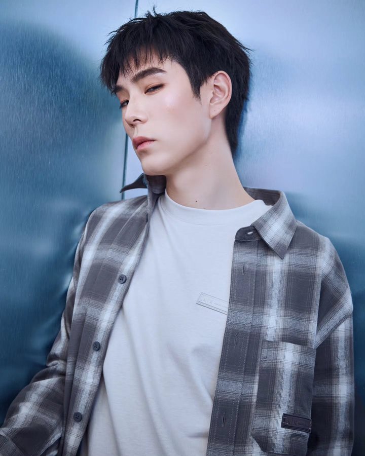 Instagram post by @jaylerr for Armani Exchange. Caption reads: Signature style redefined with Armani Exchange....