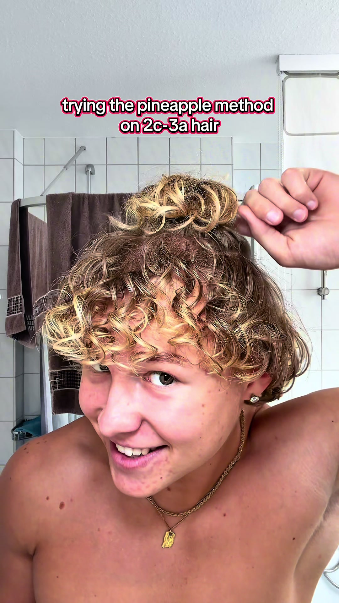 TikTok post by @22waldemar for Based Bodyworks. Caption reads: trying the pineapple method on 2c-3a hair | ad....