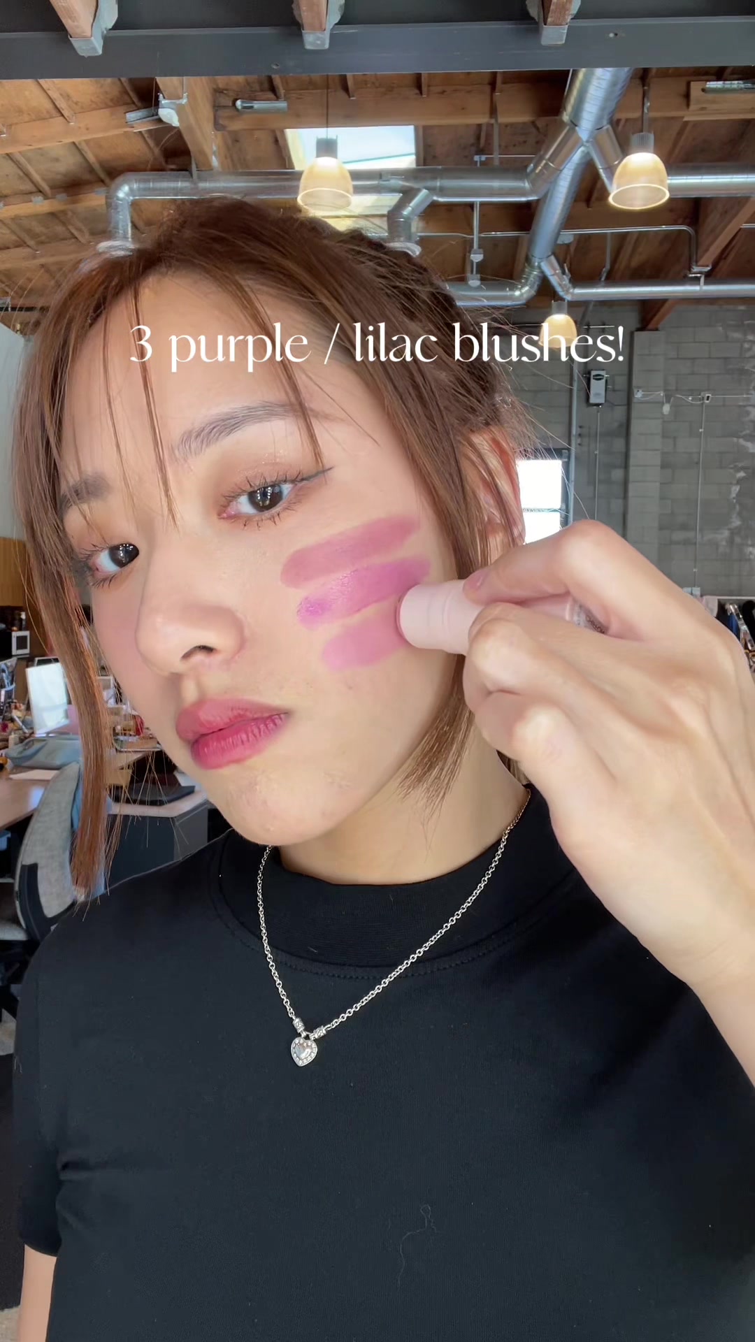 TikTok post by @heyitstephy for EM Cosmetics. Caption reads: [...] FAVORITE purple / lilac blushes by @EM....