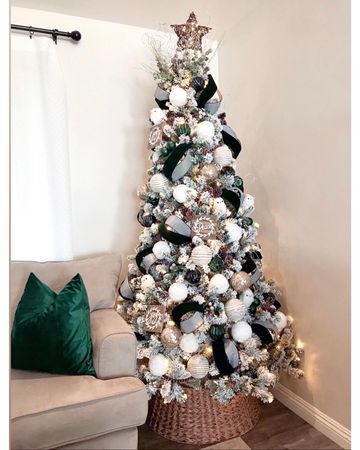 Instagram post by @korin.armida for biglots. Caption reads: My baby the star of the show 🎄💚 I’m obsessed....
