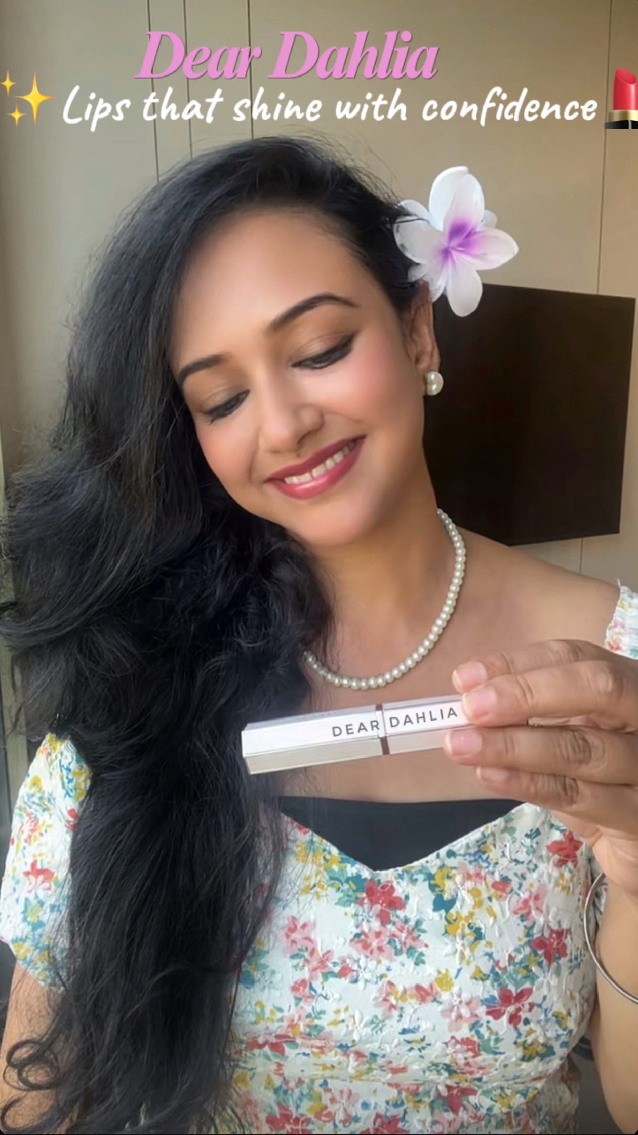 Instagram post by @wat.she.cooks for DearDahlia. Caption reads: Lips that shine with confidence ✨💋 

I’m loving....