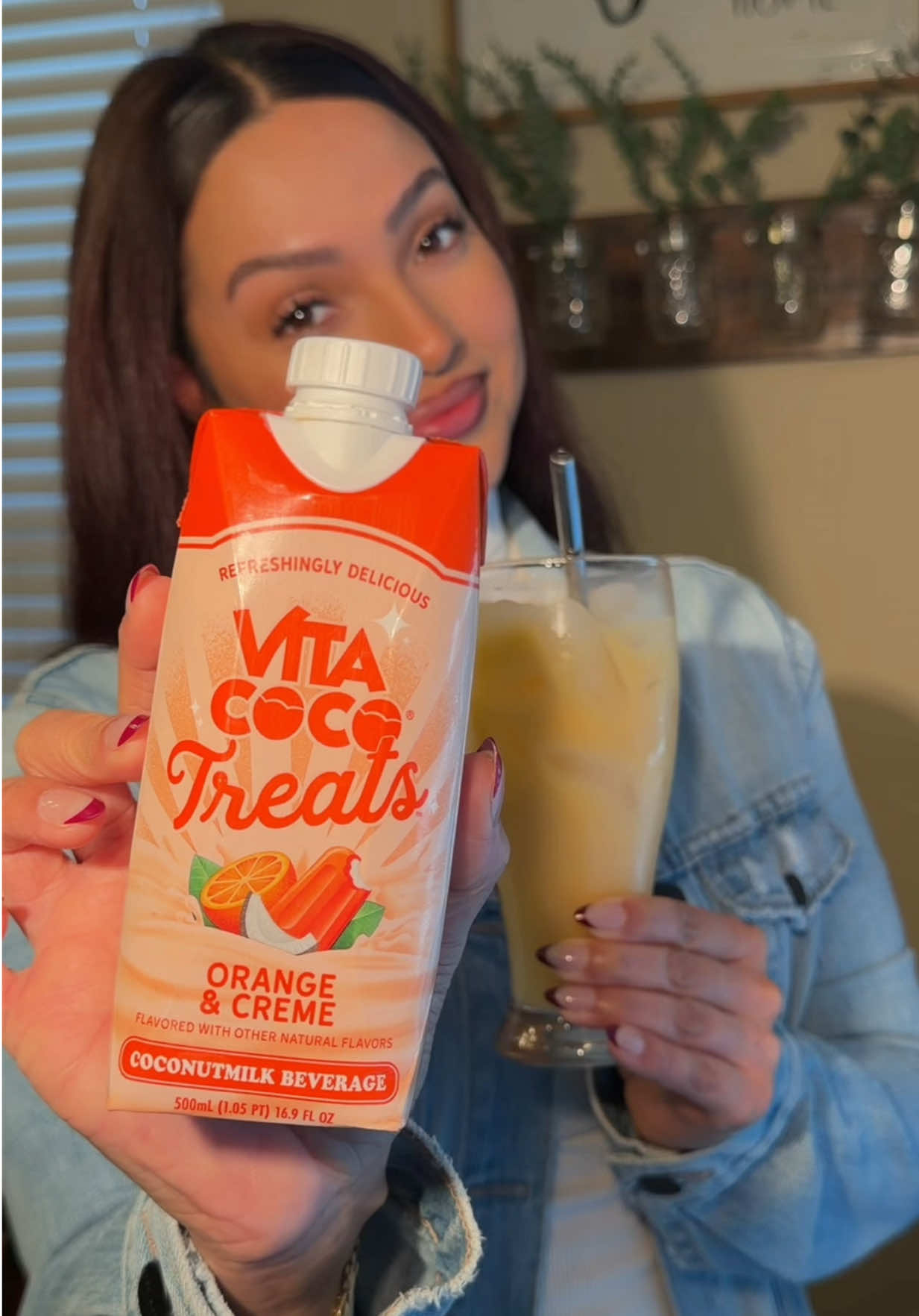 TikTok post by @yessigill for Vita Coco. Caption reads: [...] welcome 🍊 🍦🧡 #kalecreator #vitacocotreats....