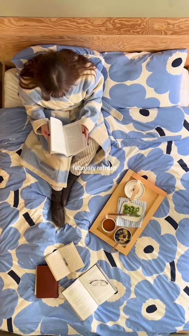 Instagram post by @lille_arkiv for Marimekko. Caption reads: [...] reminder to slow things down, with....