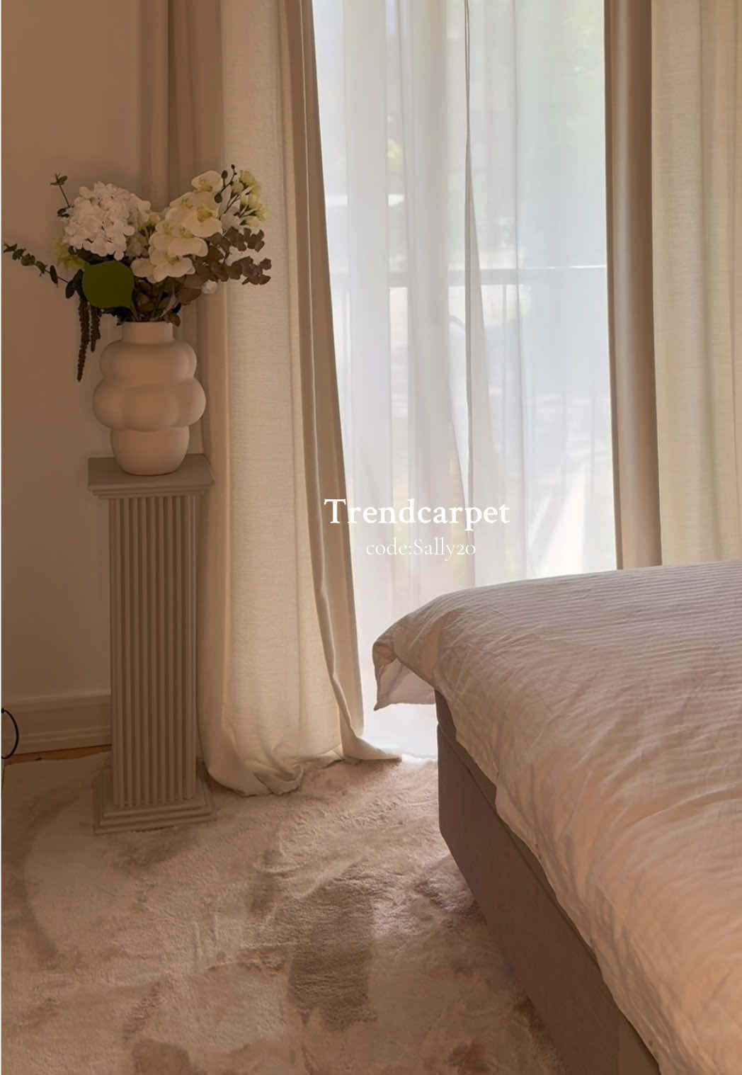 TikTok post by @sallyabouali for Trendcarpet. Caption reads: In love with my new cozy carpet from @Trendcarpet....