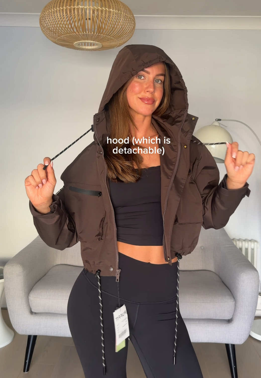 TikTok post by @s_b_77 for PUFFIT. Caption reads: [...] rain jacket perf for a UK summer !! 🌧️....