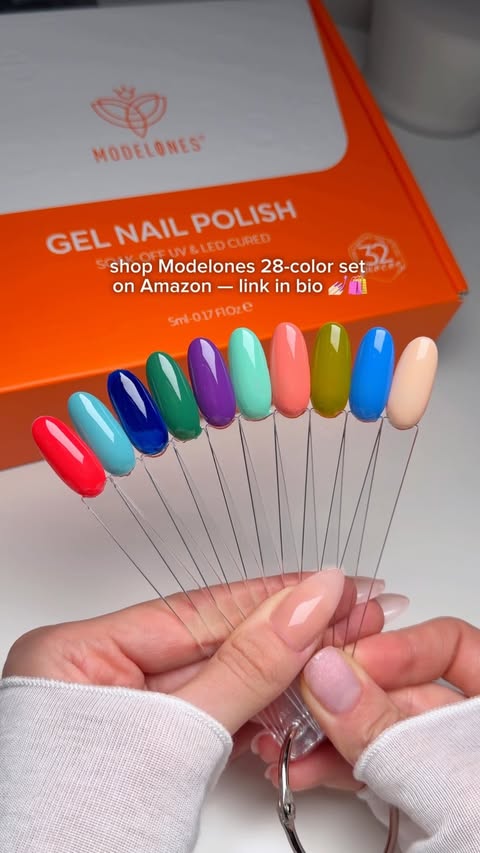 Instagram post by @softlux.nails for Modelones. Caption reads: [...] this beautiful collection 💅 shop the....