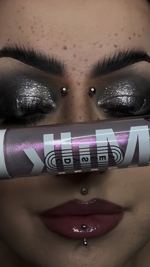 Instagram post by @beckyaddams for NYX Cosmetics. Caption reads: little lipgloss vid for you from the archives....