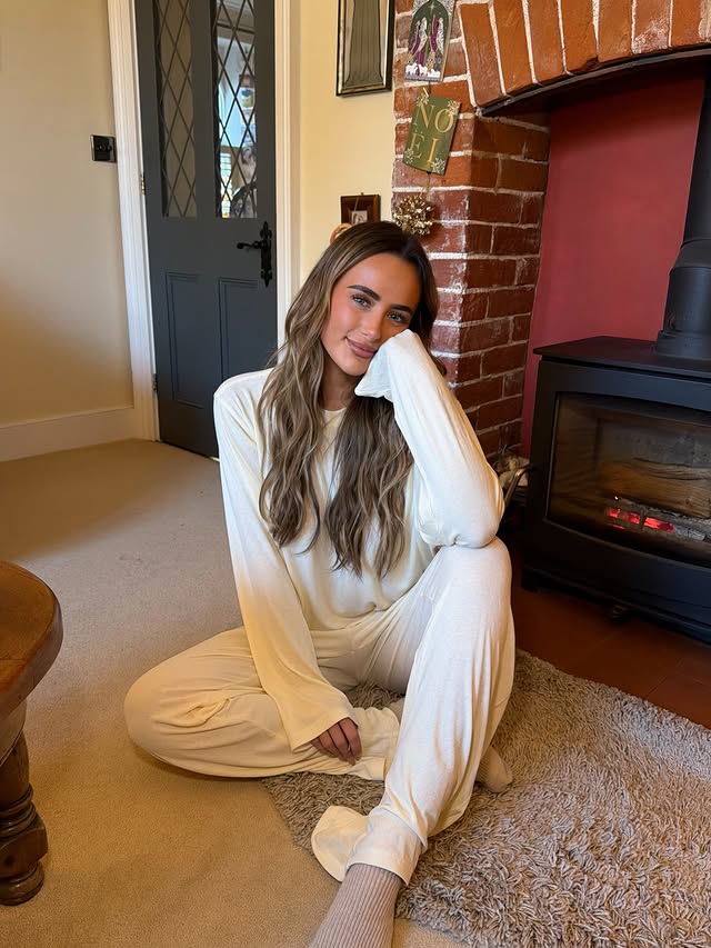 Instagram post by @milliegracecourt for White Fox Boutique. Caption reads: cosy pjs, family and doggo. all I need at Xmas… oh....