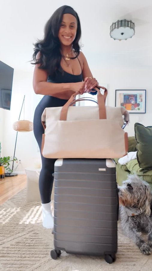 Instagram post by @justaddhotsauce for Away. Caption reads: I’m traveling back to my home by the sea for....