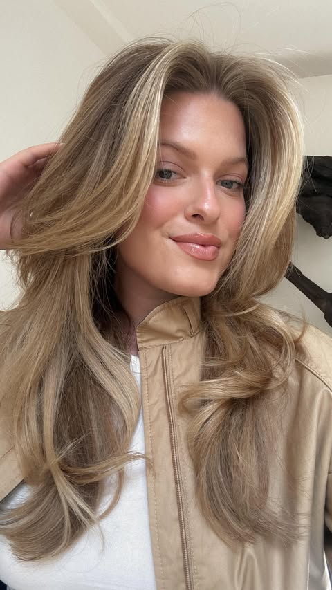 Instagram post by @astoldbymeredith for Revlon Hair Tools. Caption reads: accidentally tested my mom’s christmas gift and…....