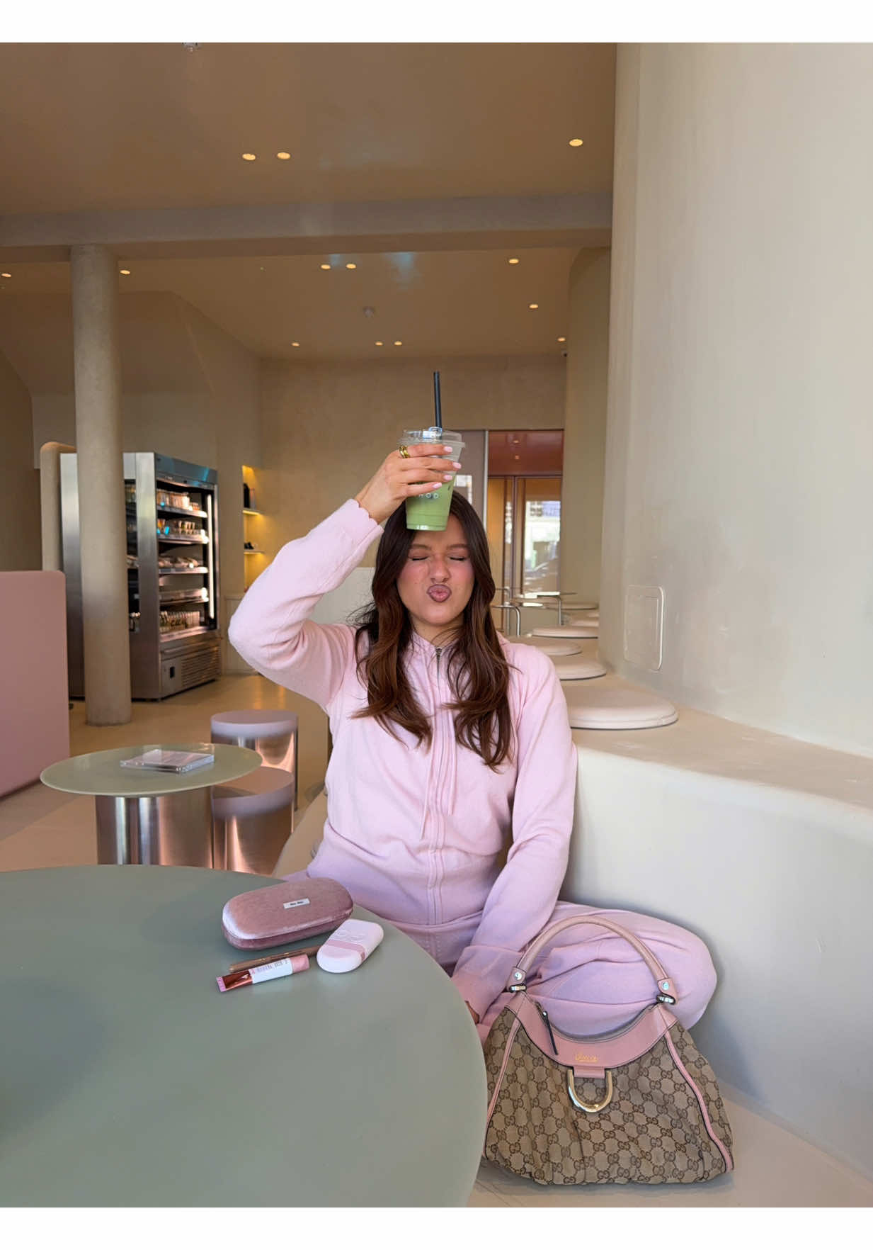 TikTok post by @milliefisherr for Novomins. Caption reads: this @Novomins de-puff & sculpt bundle changed my....