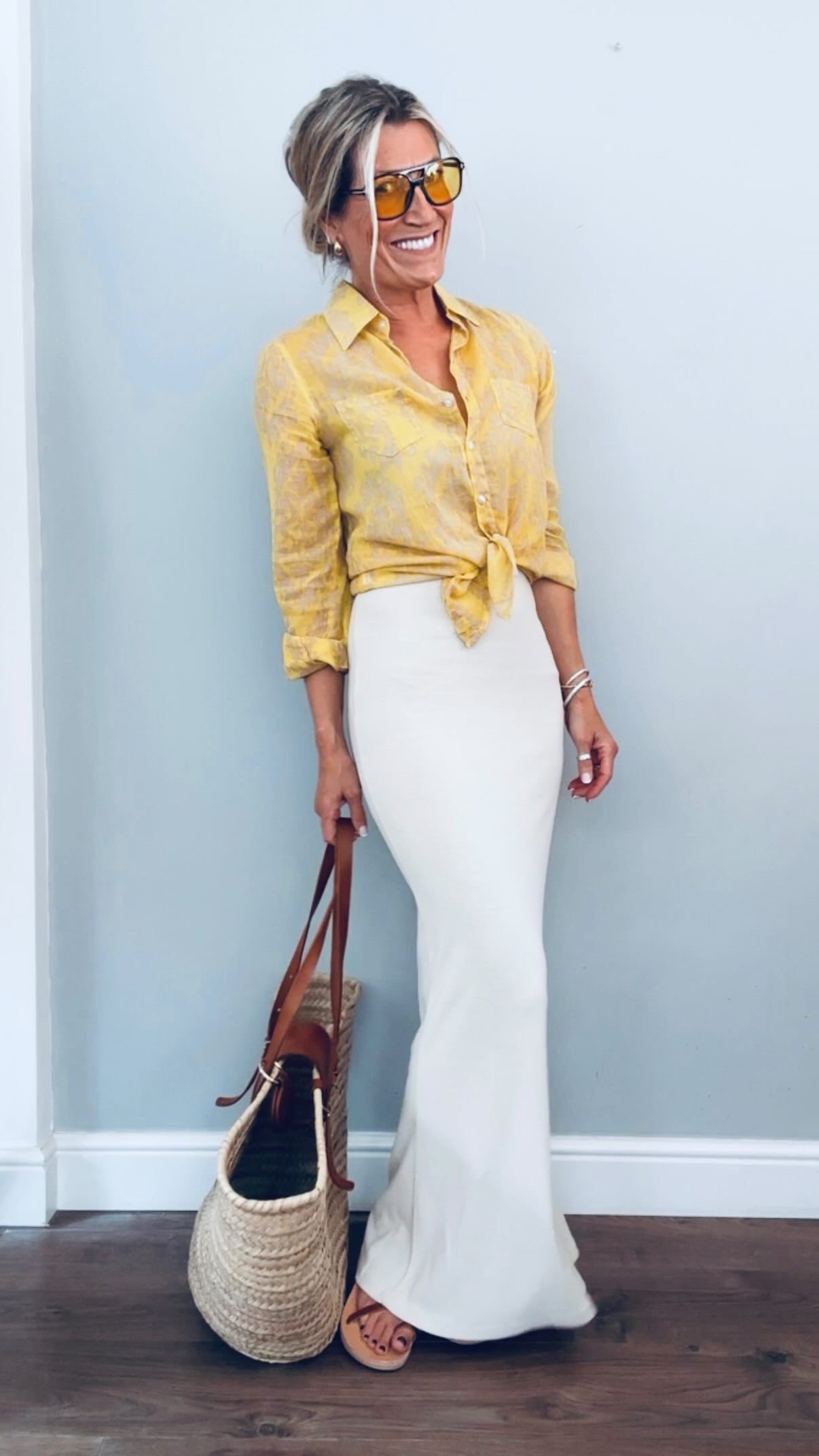 Instagram post by @abi.loves.style for OutDazl. Caption reads: Yellow is one of my favourite colours as it always....