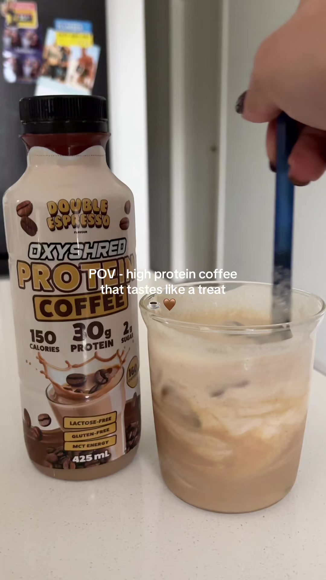 TikTok post by @isabellazollo for OxyShred Energy. Caption reads: [...] to your morning coffee ☕️ 🤎 @OxyShred....