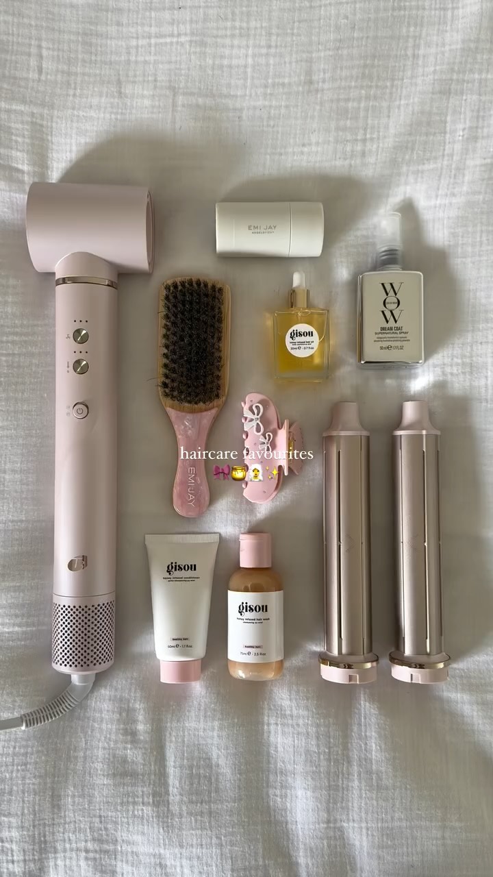 Instagram post by @carrieanne_ for Emi Jay. Caption reads: haircare faves 🎀🍯🧖‍♀️

@t3micro Aire 360 in....