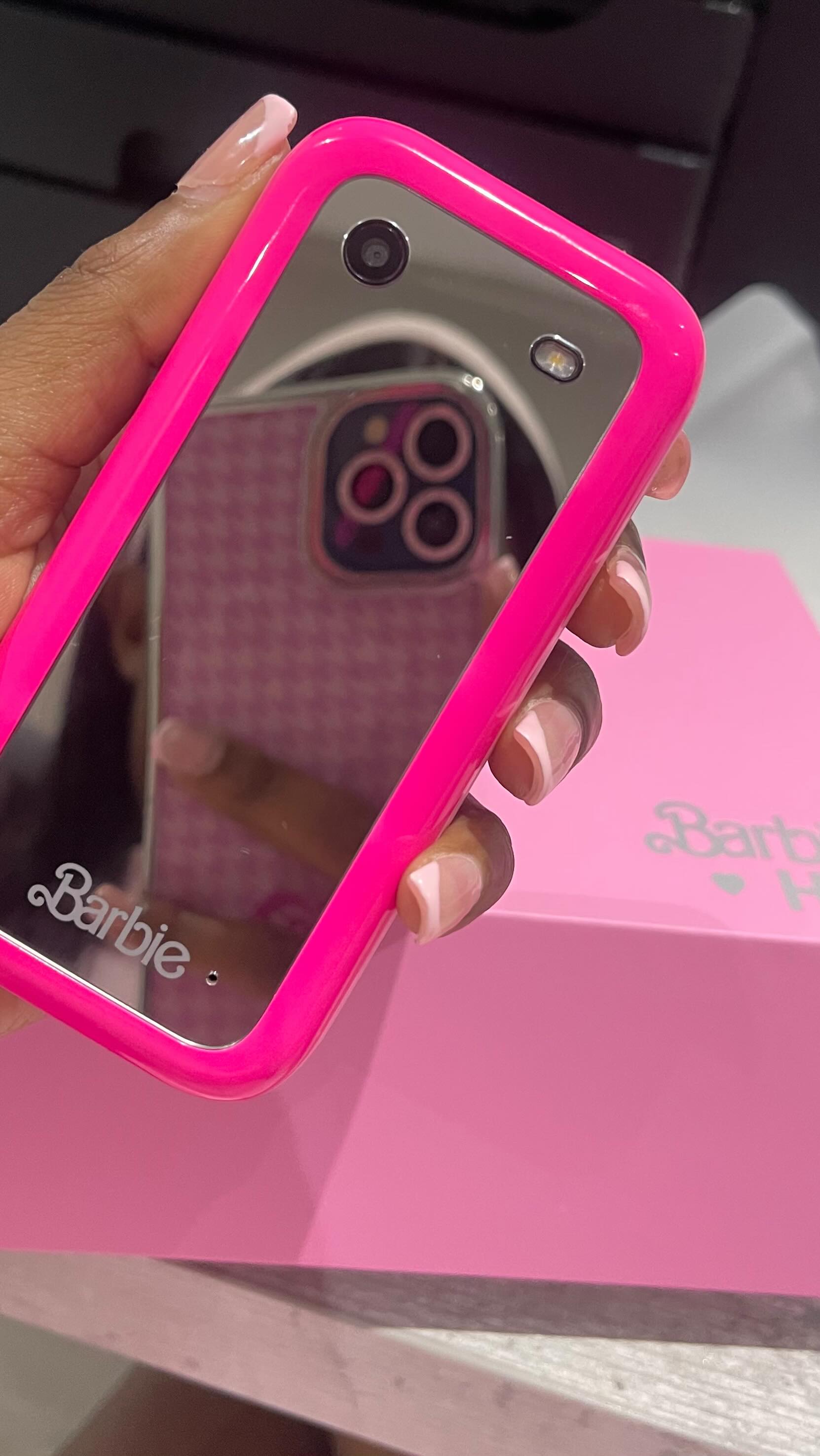 Instagram post by @faith_nonyane for HMD. Caption reads: Unboxing the HMD Barbie phone 🌸🌸🌸 #barbie #hmd....