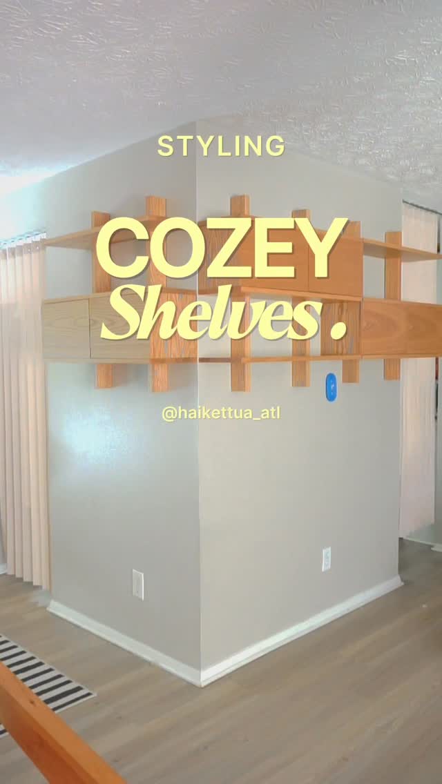 Instagram post by @haikettua_atl for Cozey. Caption reads: Finally got my dream wall shelf — modular, sturdy,....