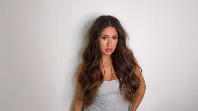 Instagram post by @evabenss for Authentic Beauty Concept. Caption reads: No need to talk, my hair does.....