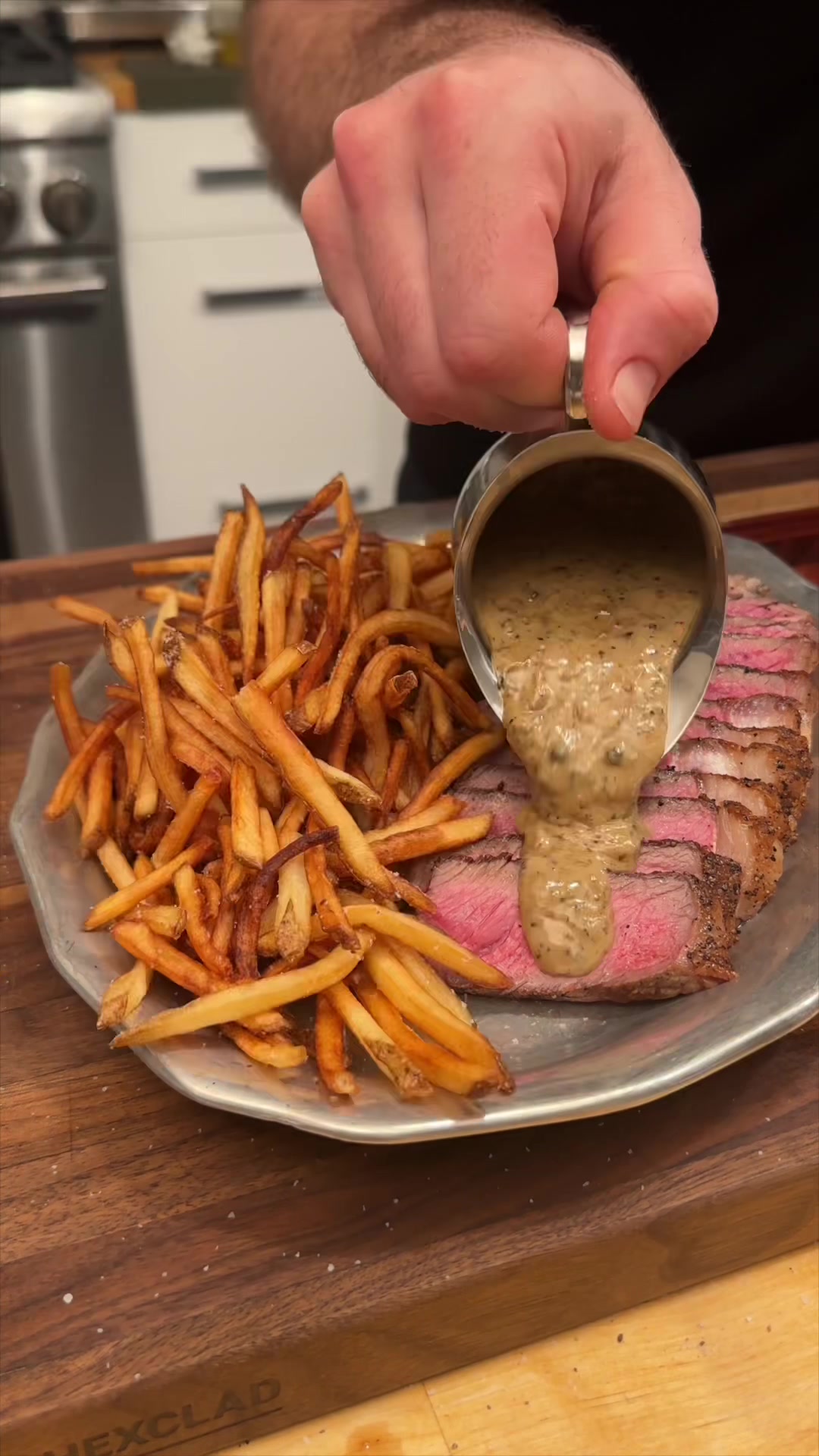 TikTok post by @bengingi for HexClad. Caption reads: You don’t need a reservation—just a good pan and....