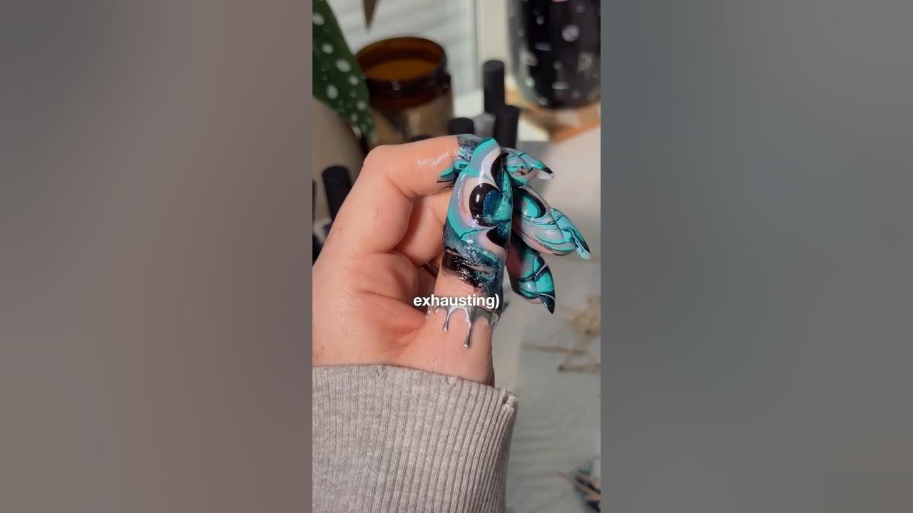 YouTube post by @thegraytergood for Davidstea. Caption reads: I’ve been waiting for this 😭💅🏻🫖#nailart....