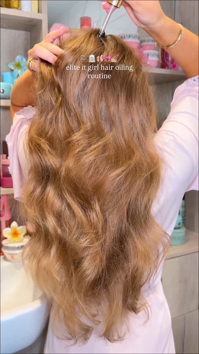 Instagram post by @byemmaleah for Fable And Mane. Caption reads: elite it girl hair oiling routine....