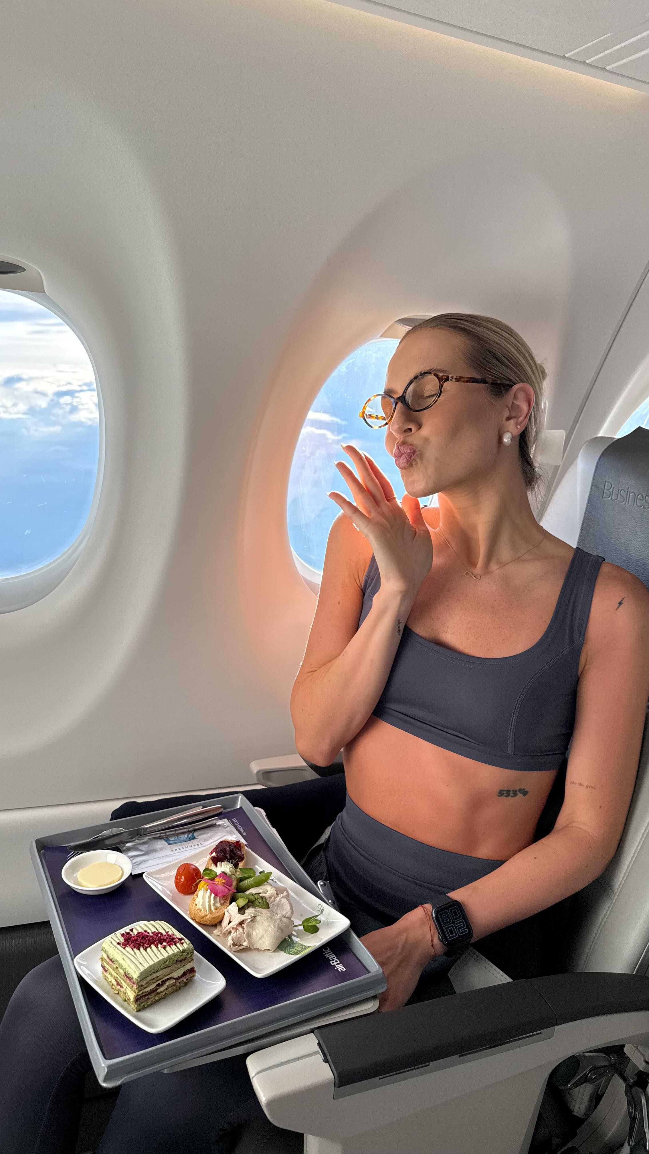 Instagram post by @dandi.couple for airBaltic. Caption reads: “Ladies and gentlemen, this is your captain....