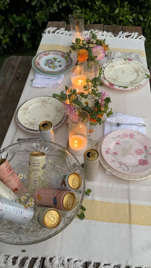 Instagram post by @talliia for Mom Water. Caption reads: [...] hangs while I can 🕯️ and loving....