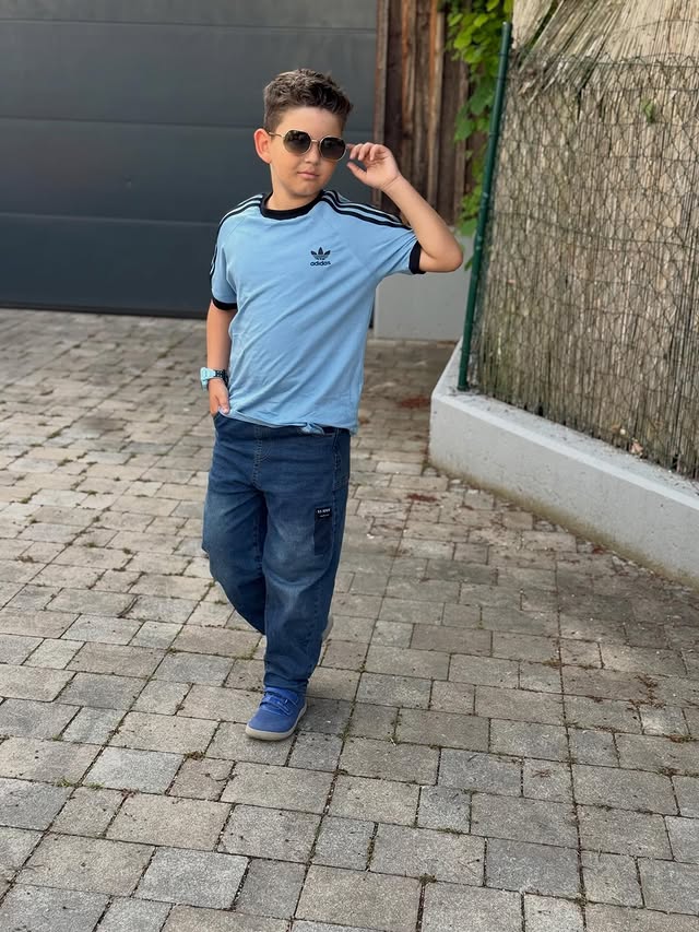 Instagram post by @ervini.style for Kids Brand Store. Caption reads: AD/ T-shirt @kidsbrandstore.