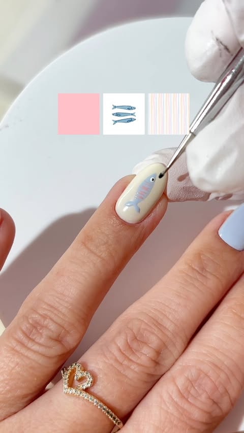 Instagram post by @emilia_rose_beauty for Beetles Gel Polish. Caption reads: [...] the last bit of summer 🐟🩷 Using....