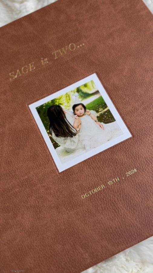 Instagram post by @nycmomjia for Artifact Uprising. Caption reads: #sponsored Honoring My Daughter’s Second Birthday....