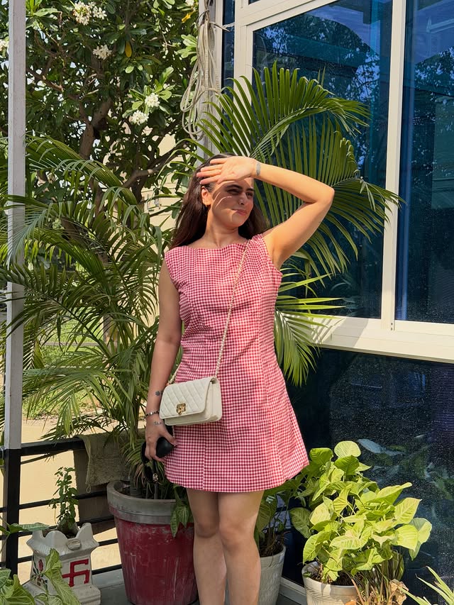 Instagram post by @sanch.li for CHARLES & KEITH. Caption reads: [...] Barbie outfit✅ Dress- gifted Bag-....