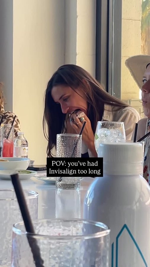 Instagram post by @sarahwoodardtravels for Invisalign. Caption reads: That’s cute you still clean your teeth in the....