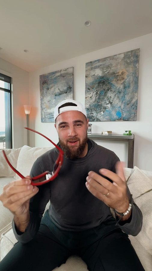 Instagram post by @jordantsanford for EssilorLuxottica. Caption reads: GRWM for a workout with my new Scuderia Ferrari....